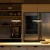 Lampa-wisz-ca-Mayfair-malowana-na-parasolka-Led-blask-metalowa-obudowa-replika-lampa-sto-owa-do.jpg_.webp